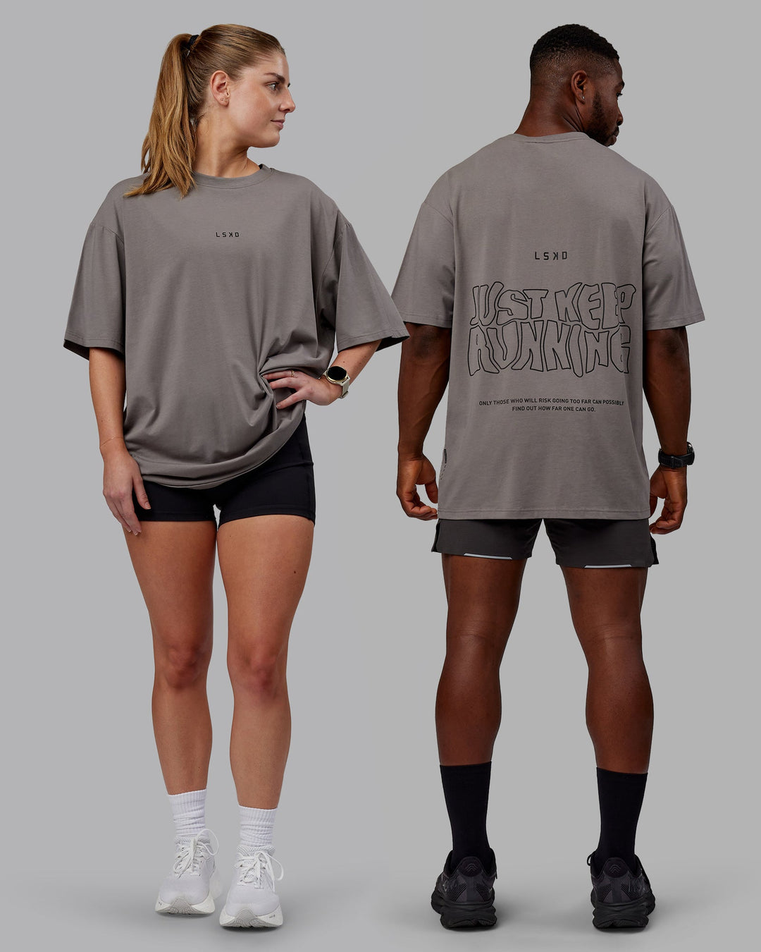 Duo wearing Unisex Leg It FLXCotton Tee Oversize - Storm Front-Black