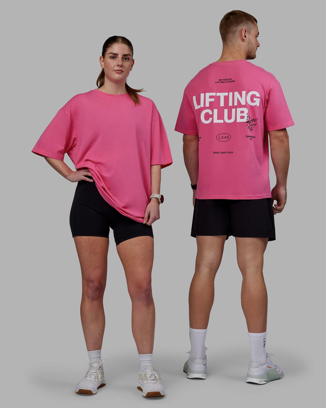 Duo wearing Unisex Lifting Club FLXCotton Tee Oversize - Carmine Rose-White