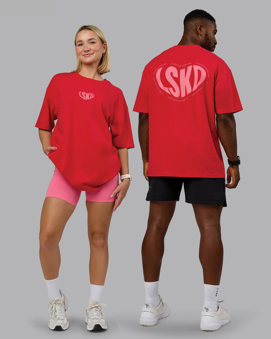 Duo wearing Unisex Love To Train FLXCotton Tee Oversize in Scarlet-Pink Lemonade | Size:Duo