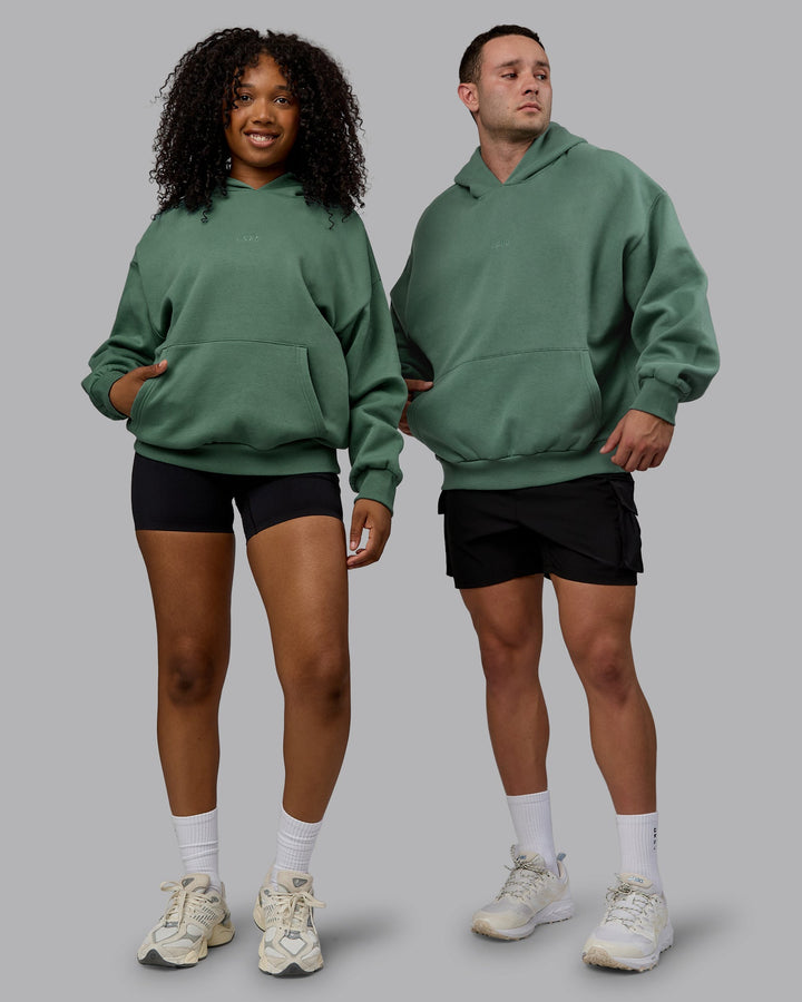 Duo wearing Unisex MVP Hoodie Oversize - Sage Brush
