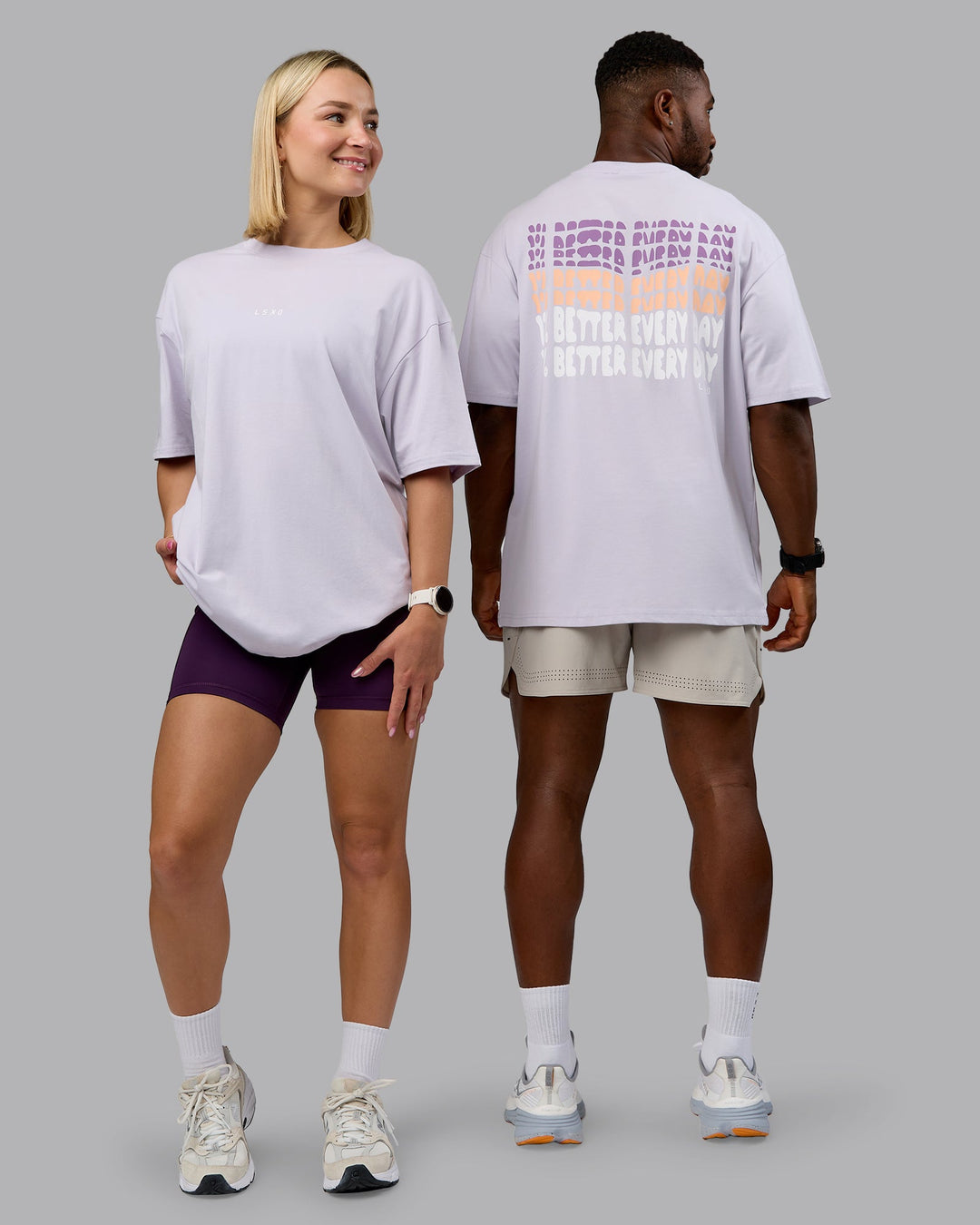 Duo wearing On Repeat FLXCotton Oversized Tee - Galactic Lilac-Peach Fuzz | Model:Both | Size:Duo