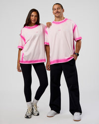 Duo wearing Urban Blur Heavyweight Unisex Oversized Tee - Off White-Ultra Pink | Model:Both | Size:Duo