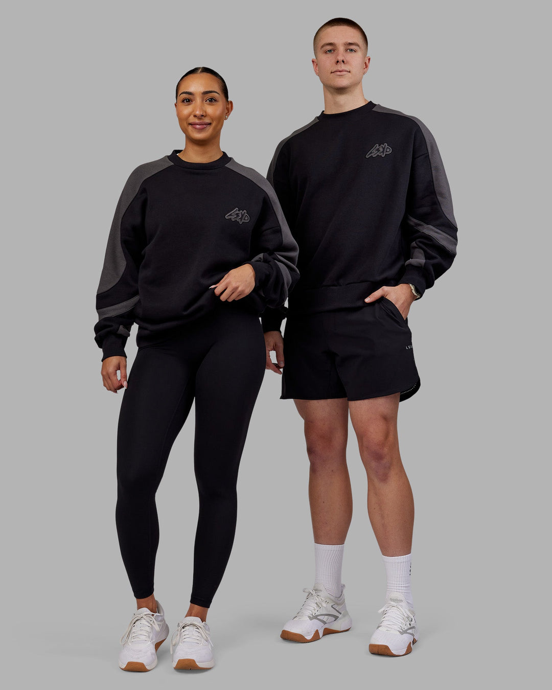 Duo wearing Vibe Oversized Unisex Sweater - Black-Dark Storm | Model:Both | Size:Duo
