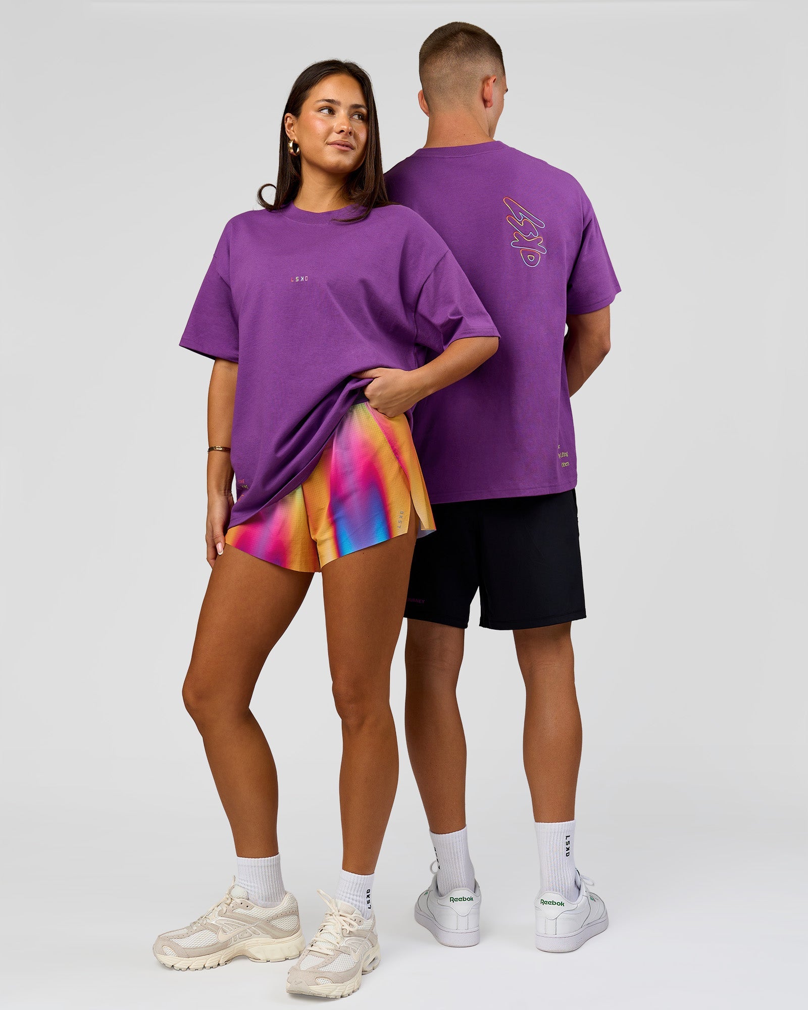 Duo wearing Pride Sticker Boxy Tee - Fresh Purple | Model:Bianca | Size:XS | Model:Albert | Size:M