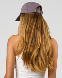 Female wearing All Day Cap in Duskstone