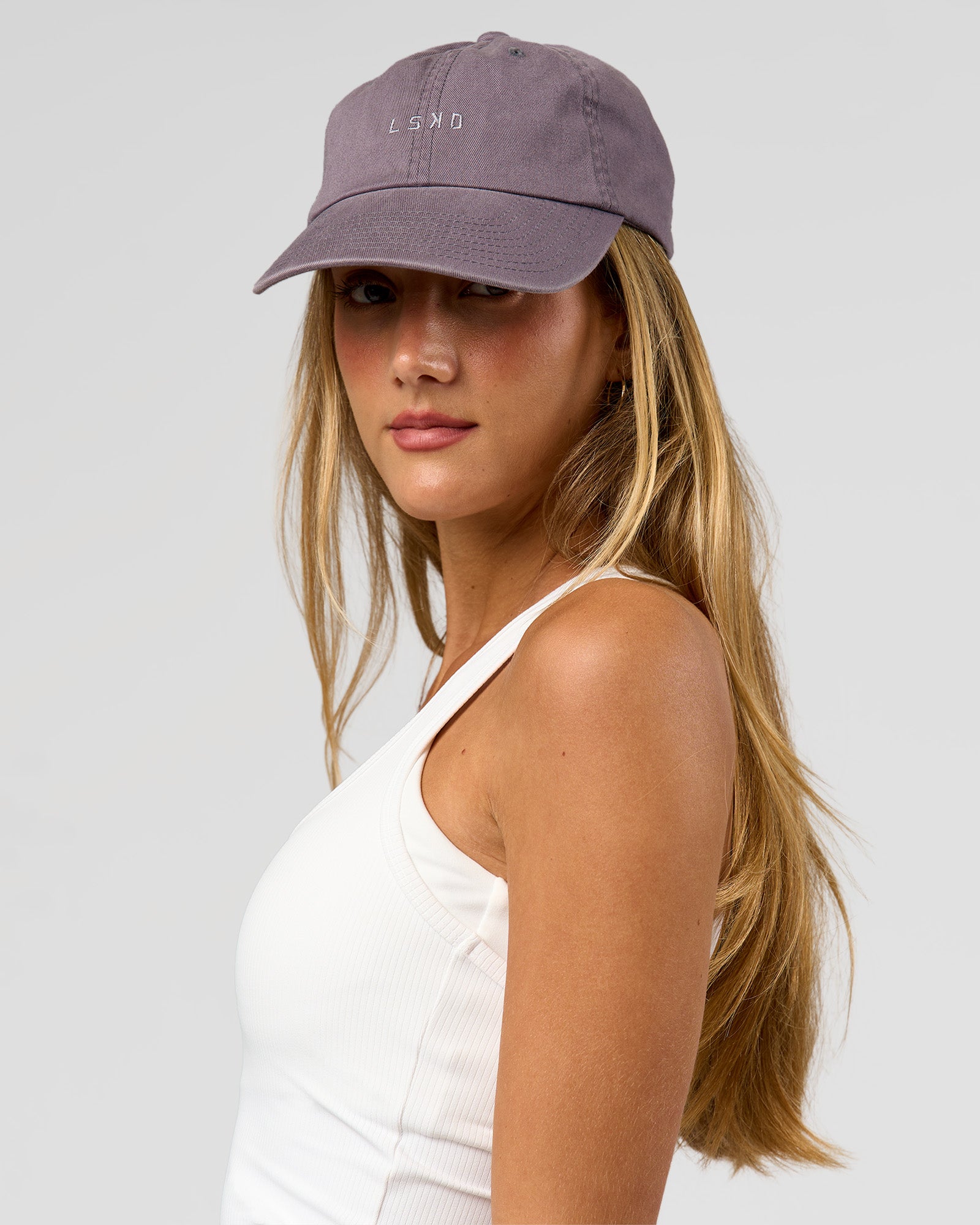 Female wearing All Day Cap in Duskstone
