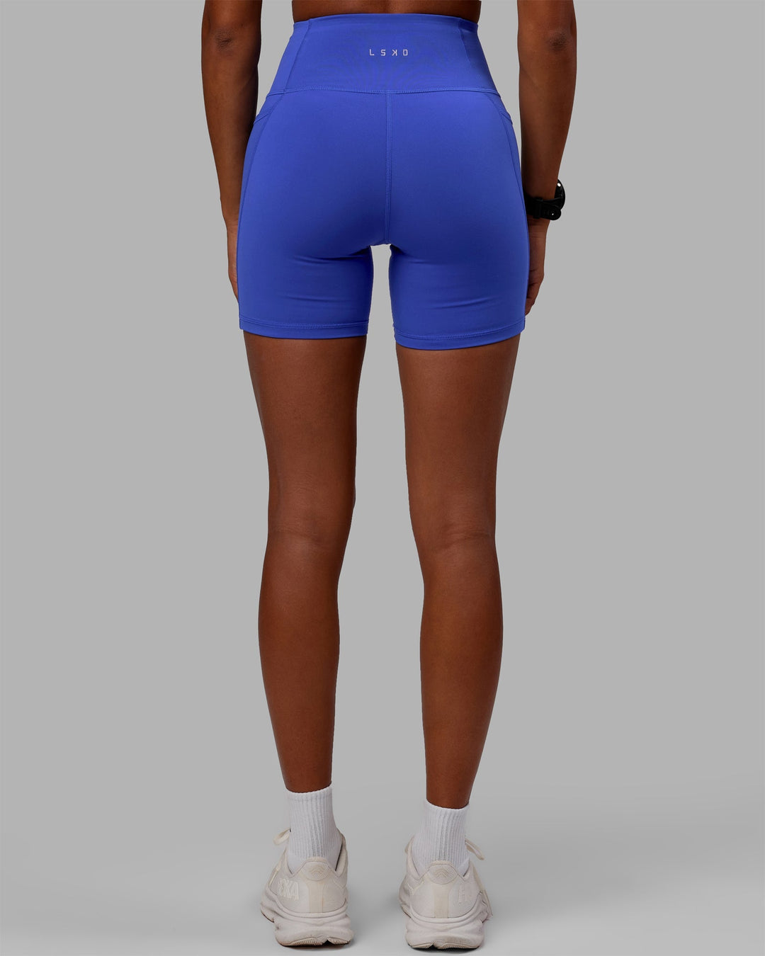 Women Wearing Flux Mid-Length Shorts - Power Cobalt