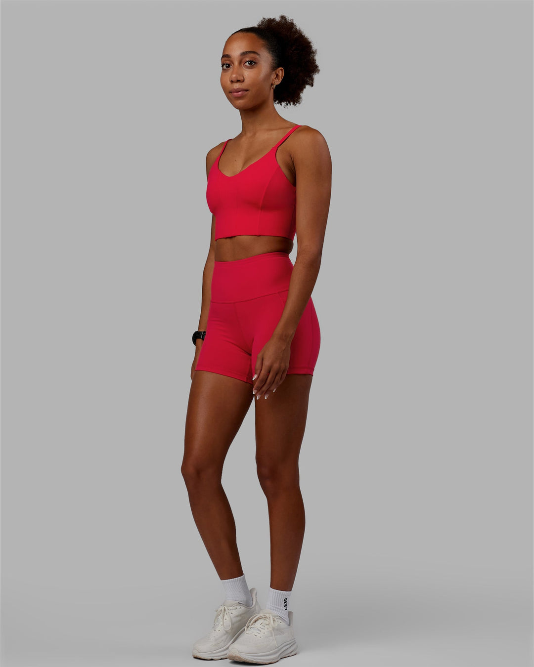 Woman wearing Flux X-Length Shorts - Scarlet