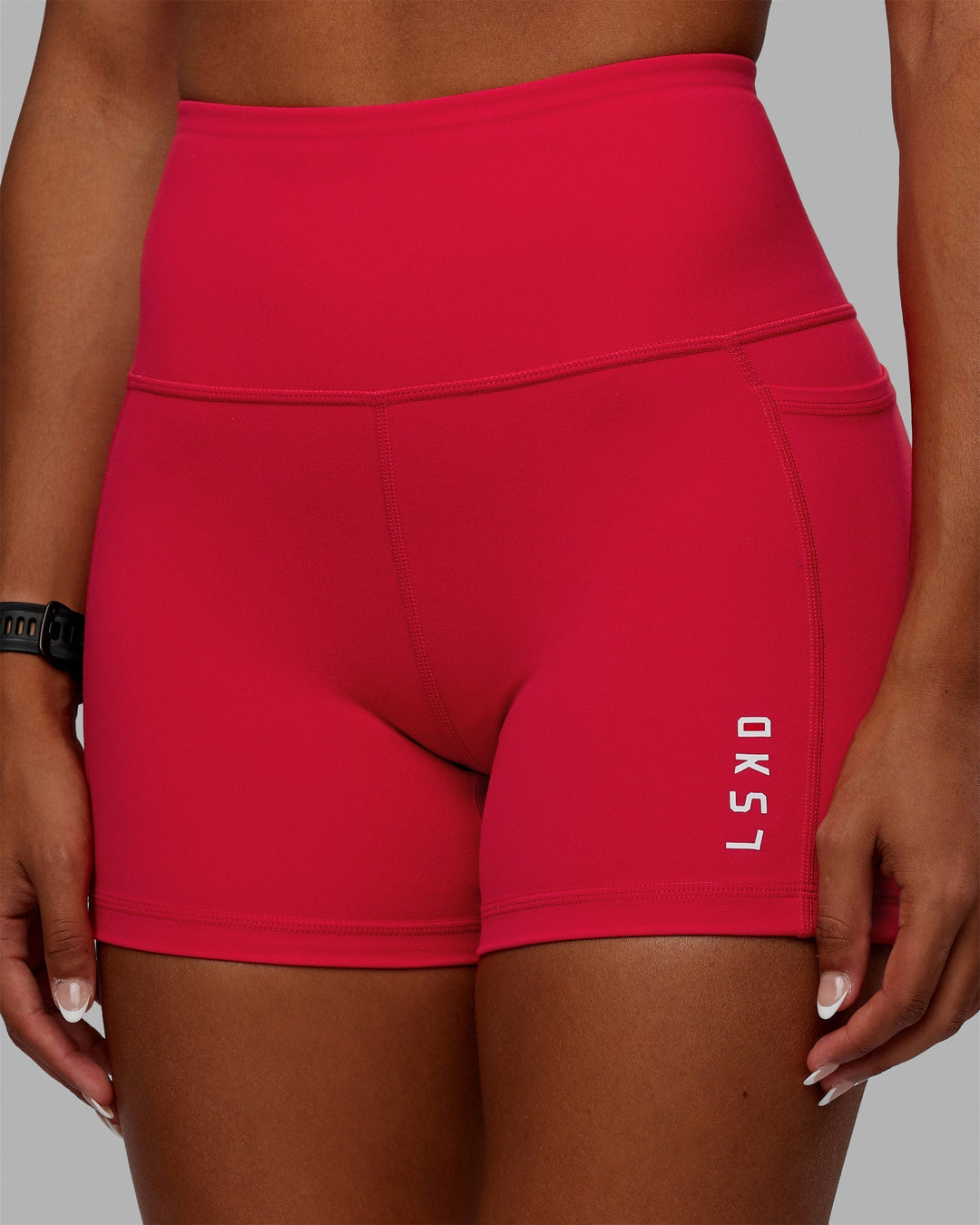 Woman wearing Flux X-Length Shorts - Scarlet