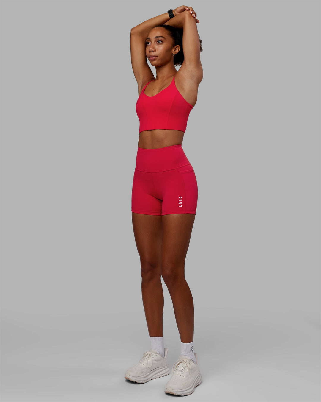 Woman wearing Flux X-Length Shorts - Scarlet