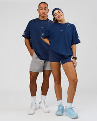 Duo wearing GG Heavyweight Oversized Tee - Future Navy | Model:Grace | Size:S | Model:Malebo | Size:M | Thumbnail Index: 1