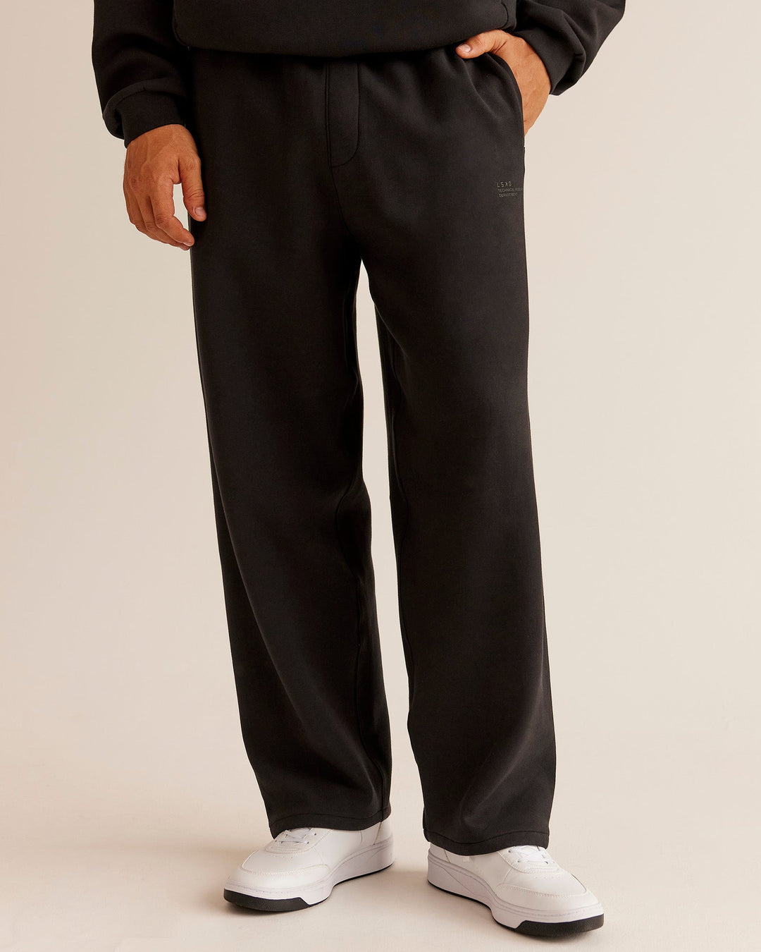 Man wearing AfterDark ZeroCrease Straight Leg Pant - Black | Model:Jackson | Size:L - view 3