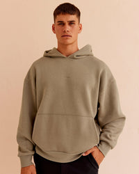 Man wearing Base Oversized Hoodie - Taupe Ash | Model:Jackson | Size:L | Thumbnail Index: 0