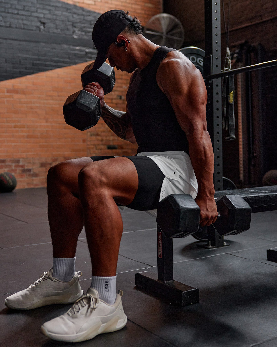 Man wearing BaseTech 8" Shorts - Black | Model:Paris | Size:L