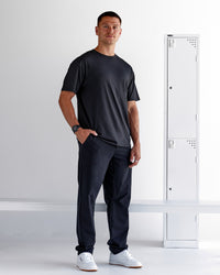Man wearing Forever EffortlessTech Tee - Black | Model:Nikola | Size:L