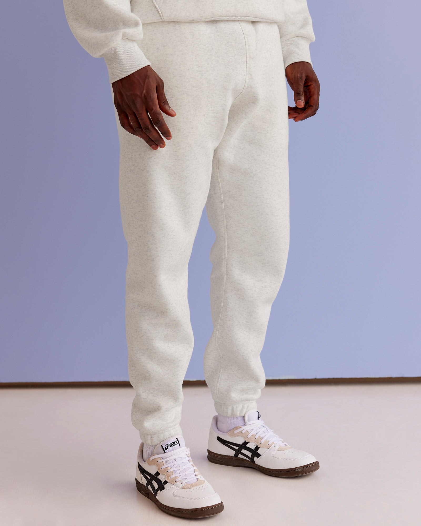 Man wearing MVP Cuffed Track Pant - Silver Marl | Model:Paabio | Size:L