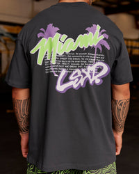 Man wearing Miami Snatch FLXCotton Oversized Tee - Dark Storm-Marshmallow | Model:Hiko | Size:L