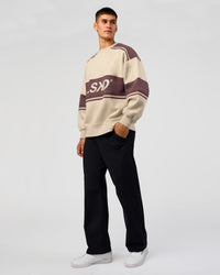 Man wearing A-Team Sweater Oversize - Shale Beige-Cocoa Powder | Model:Jackson | Size:L