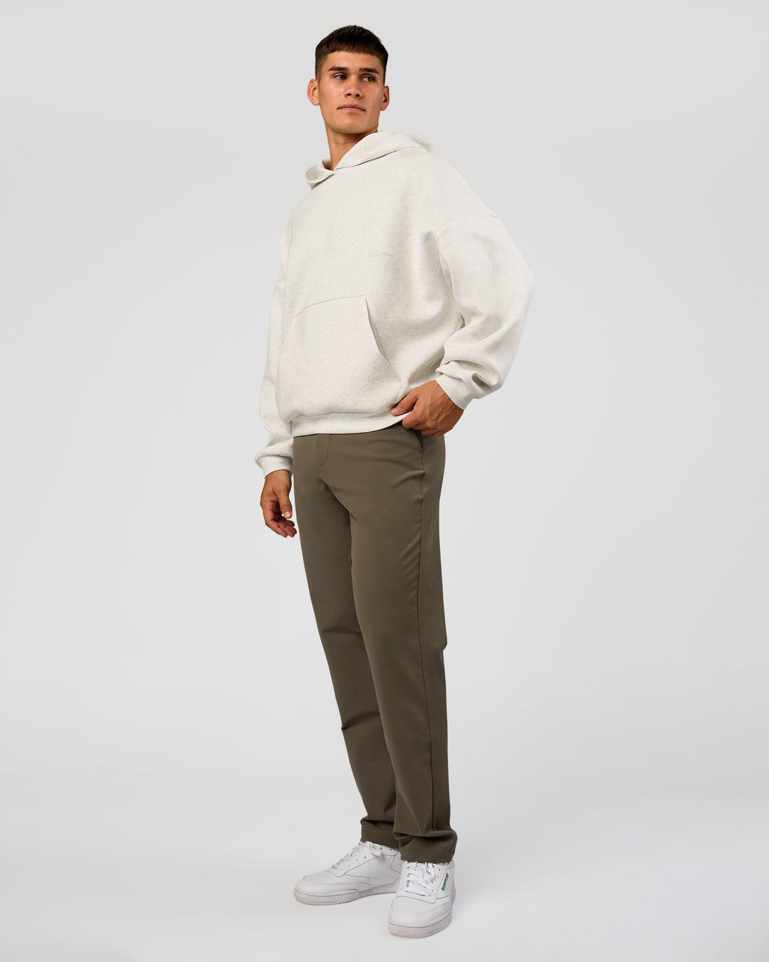 Man wearing AfterDark ZeroCrease Oversized Hoodie - Silver Marl | Model:Jackson |Size:L