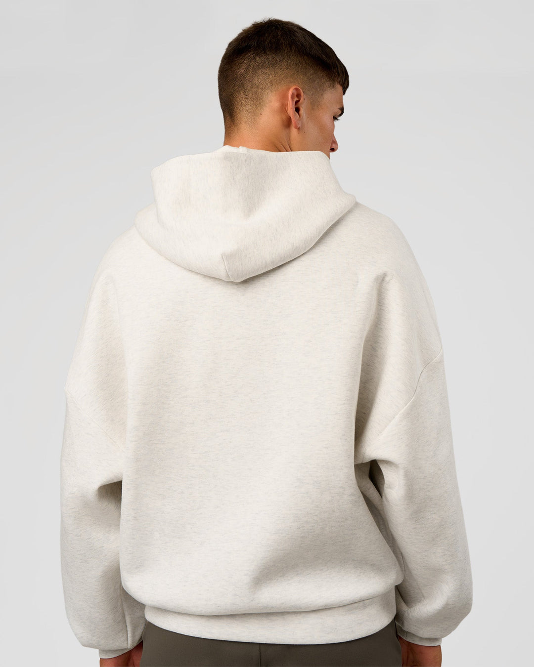 Man wearing AfterDark ZeroCrease Oversized Hoodie - Silver Marl | Model:Jackson |Size:L