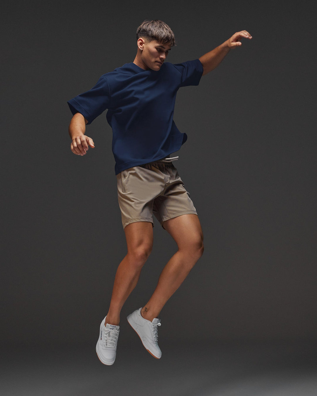 Man wearing AfterDark ZeroCrease Oversized Tee - Future Navy | Model:Jackson | Size:L