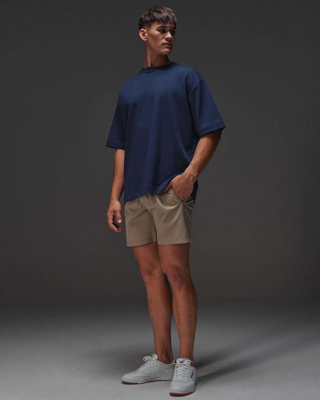 Man wearing AfterDark ZeroCrease Oversized Tee - Future Navy | Model:Jackson | Size:L