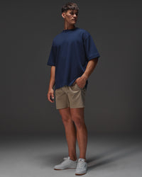 Man wearing AfterDark ZeroCrease Oversized Tee - Future Navy | Model:Jackson | Size:L