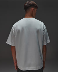 Man wearing AfterDark ZeroCrease Oversized Tee - White | Model:Jackson | Size:L