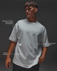 Man wearing AfterDark ZeroCrease Oversized Tee - White | Model:Jackson | Size:L