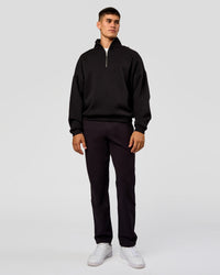 Man wearing AfterDark ZeroCrease Quarter Zip - Black | Model:Jackson | Size:L