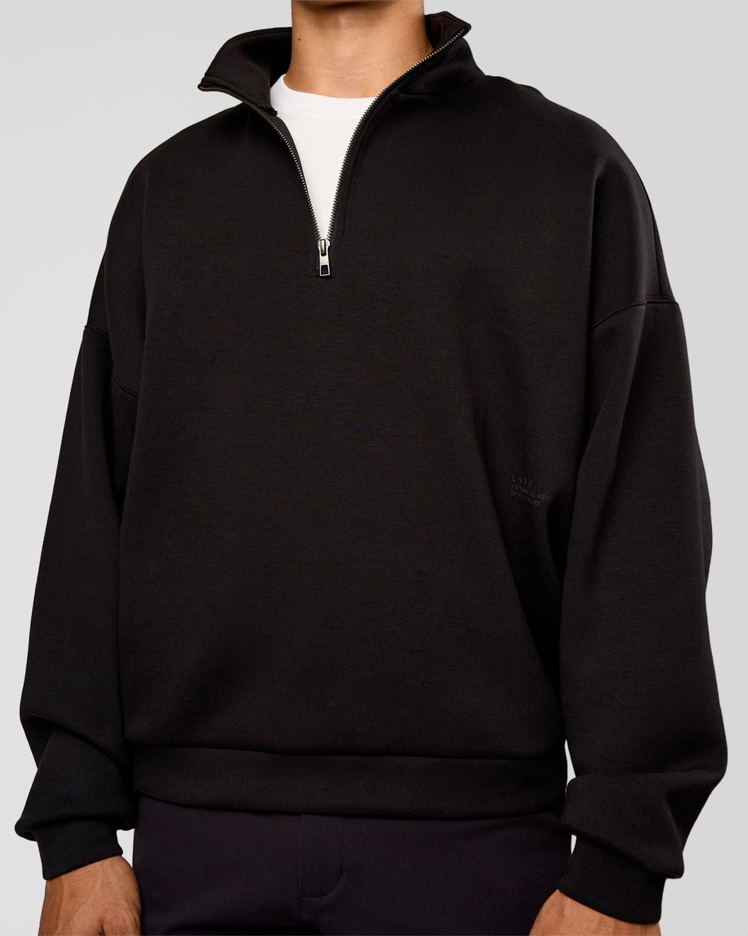 Man wearing AfterDark ZeroCrease Quarter Zip - Black | Model:Jackson | Size:L