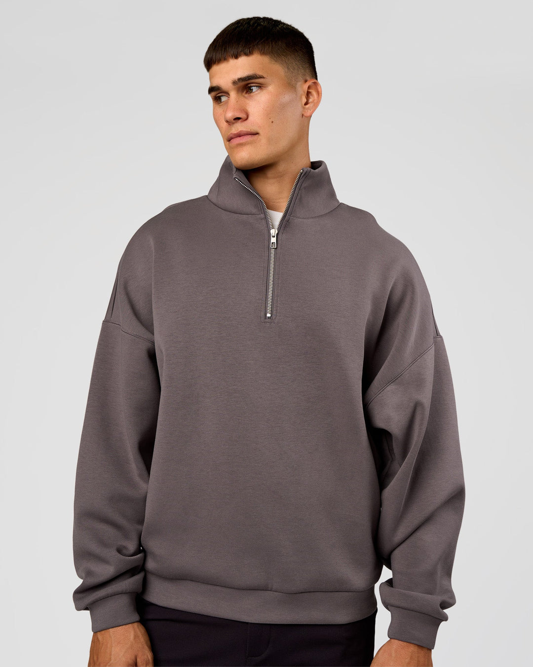 Man wearing AfterDark ZeroCrease Quarter Zip - Duskstone | Model:Jackson | Size:L
