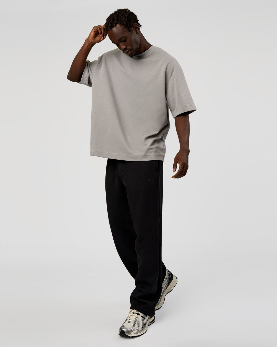 Man wearing AfterDark ZeroCrease Straight Leg Pant - Black | Model:Okello | Size:L - view 2