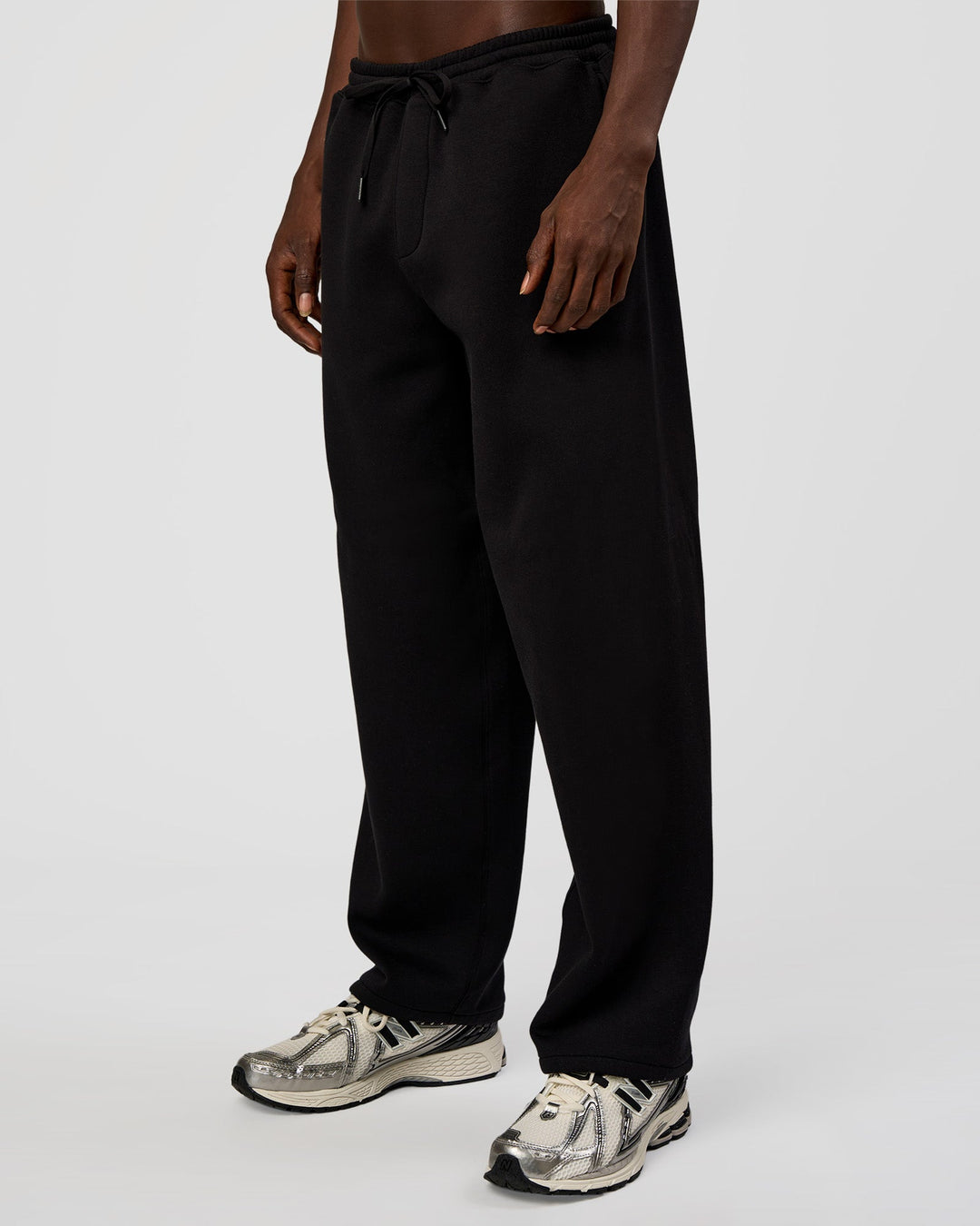 Man wearing AfterDark ZeroCrease Straight Leg Pant - Black | Model:Okello | Size:L - view 1