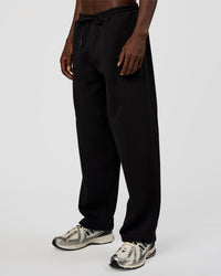 Man wearing AfterDark ZeroCrease Straight Leg Pant - Black | Model:Okello | Size:L | Thumbnail Index: 0