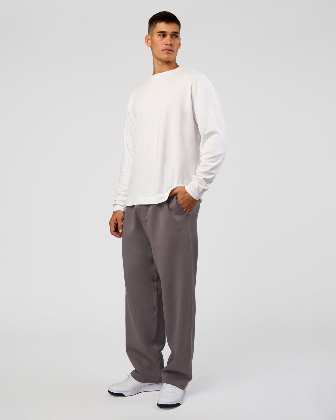 Man wearing AfterDark ZeroCrease Straight Leg Pant - Duskstone | Model:Jackson | Size:L - view 3