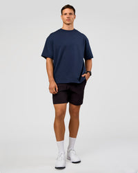 Man wearing All Day ZeroCrease™ Regular 8" Short - Black | Model:Liam | Size:34