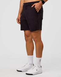 Man wearing All Day ZeroCrease™ Regular 8" Short - Black | Model:Liam | Size:34