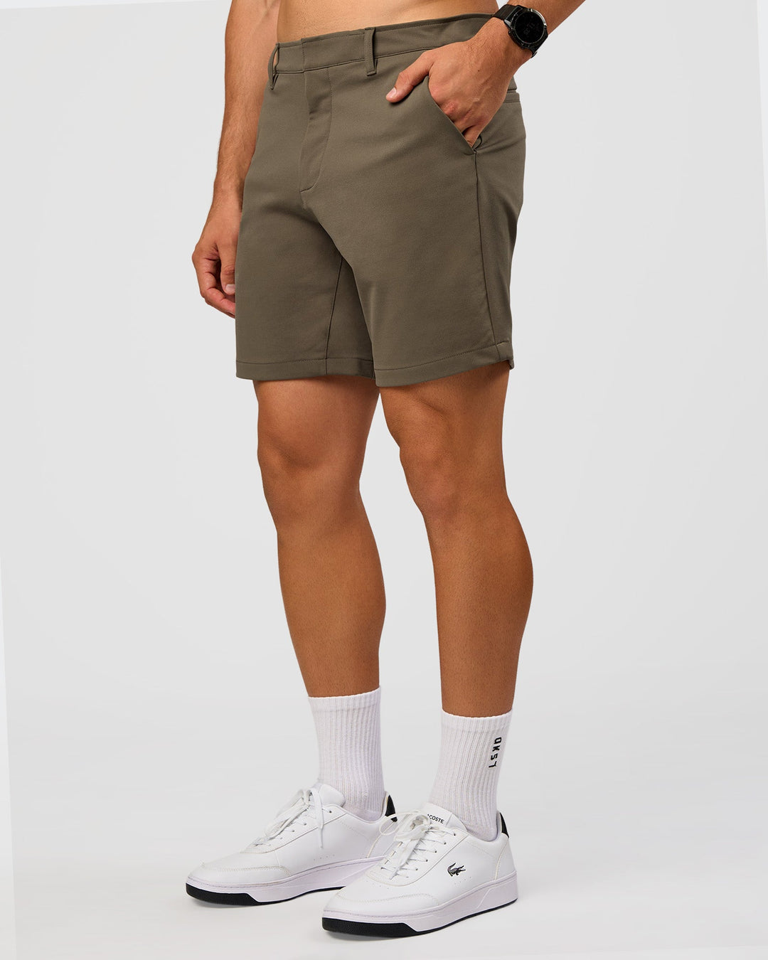 Man wearing All Day ZeroCrease™ Regular 8" Short - Walnut Grey | Model:Liam | Size:34