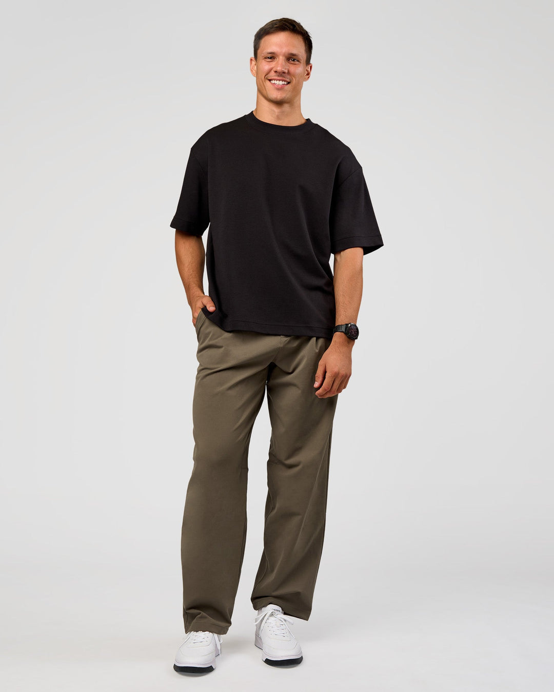 Man wearing All Day ZeroCrease™ Wide Leg Pant - Walnut Grey | Model:Liam | Size:L