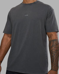 Man wearing Base FLXCotton Tee Oversized - Dark Storm Washed | Model:Xav | Size:L