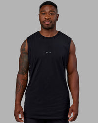 Man wearing Base FLXCotton Tank - Black | Model:Sam | Size:L