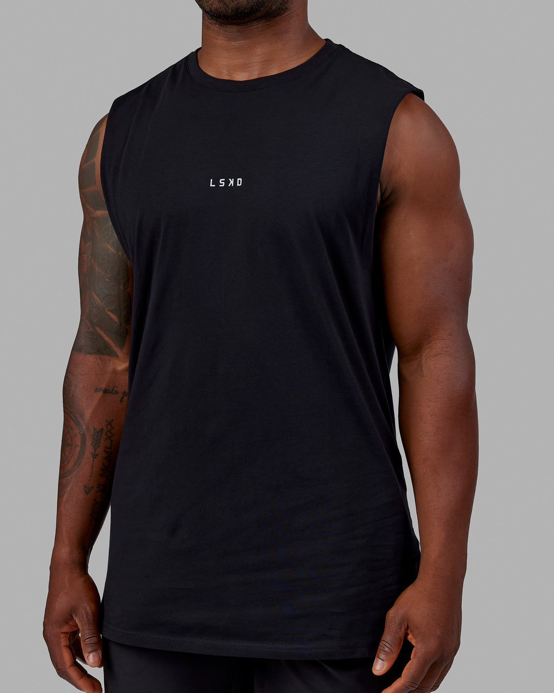 Man wearing Base FLXCotton Tank - Black | Model:Sam | Size:L