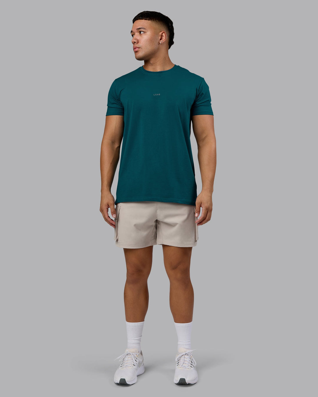 Man wearing Base FLXCotton Tee - Blue Coral | Model:Kaelyb | Size:L