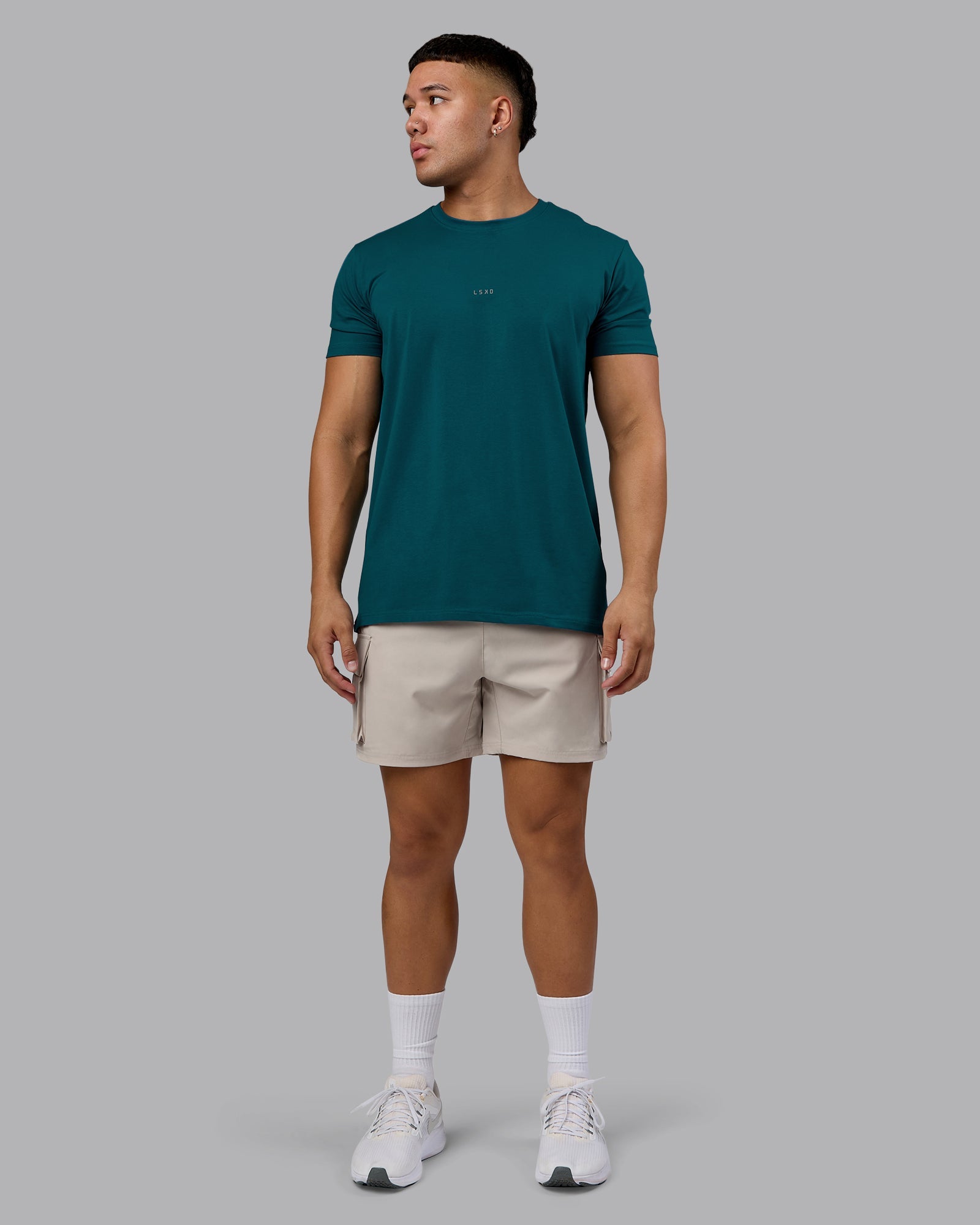 Man wearing Base FLXCotton Tee - Blue Coral | Model:Kaelyb | Size:L