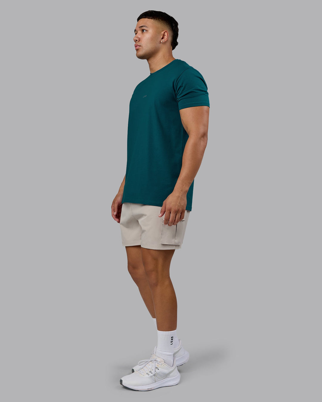 Man wearing Base FLXCotton Tee - Blue Coral | Model:Kaelyb | Size:L