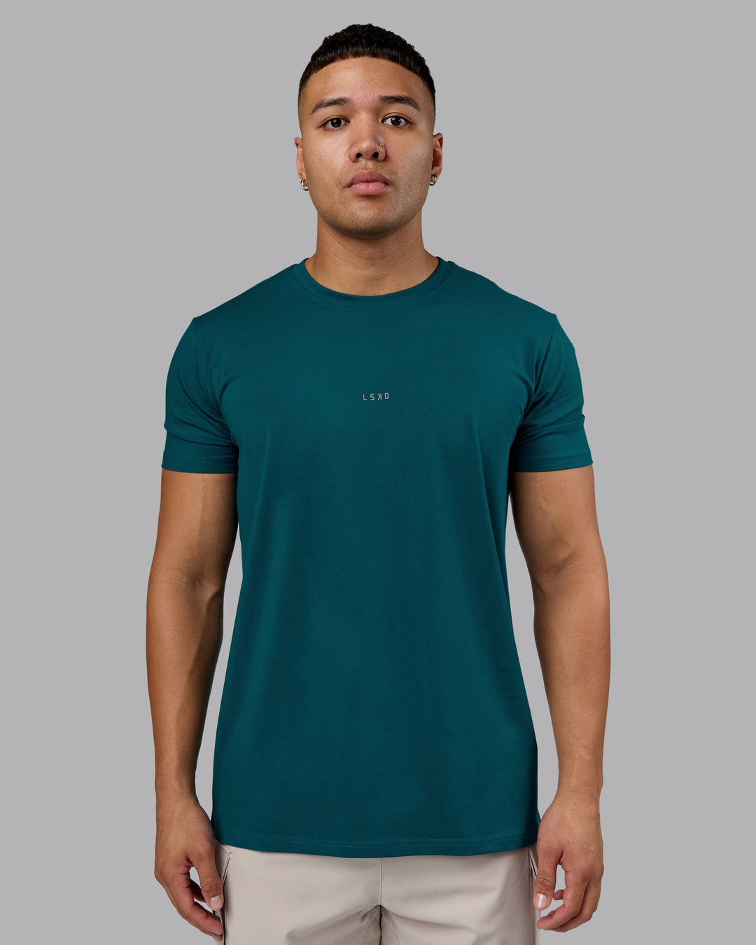 Man wearing Base FLXCotton Tee - Blue Coral | Model:Kaelyb | Size:L