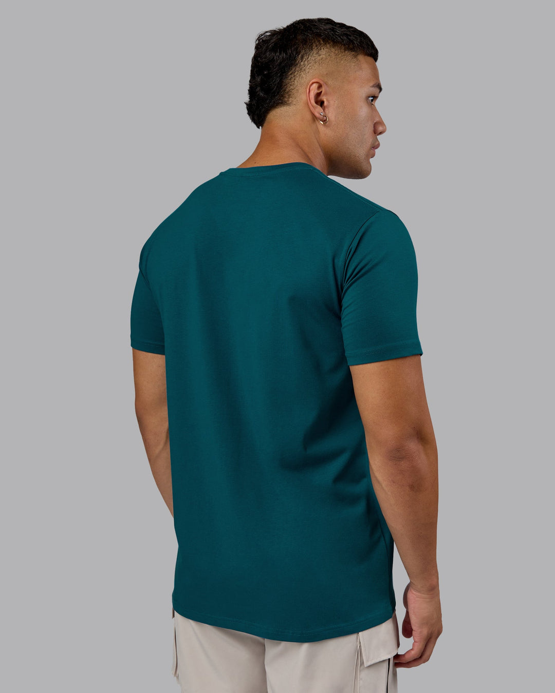 Man wearing Base FLXCotton Tee - Blue Coral | Model:Kaelyb | Size:L