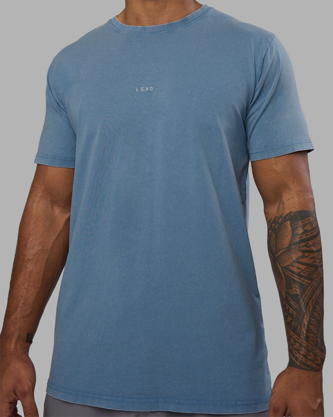 Man wearing Base FLXCotton Tee - Elemental Blue Washed | Model:Xav | Size:L