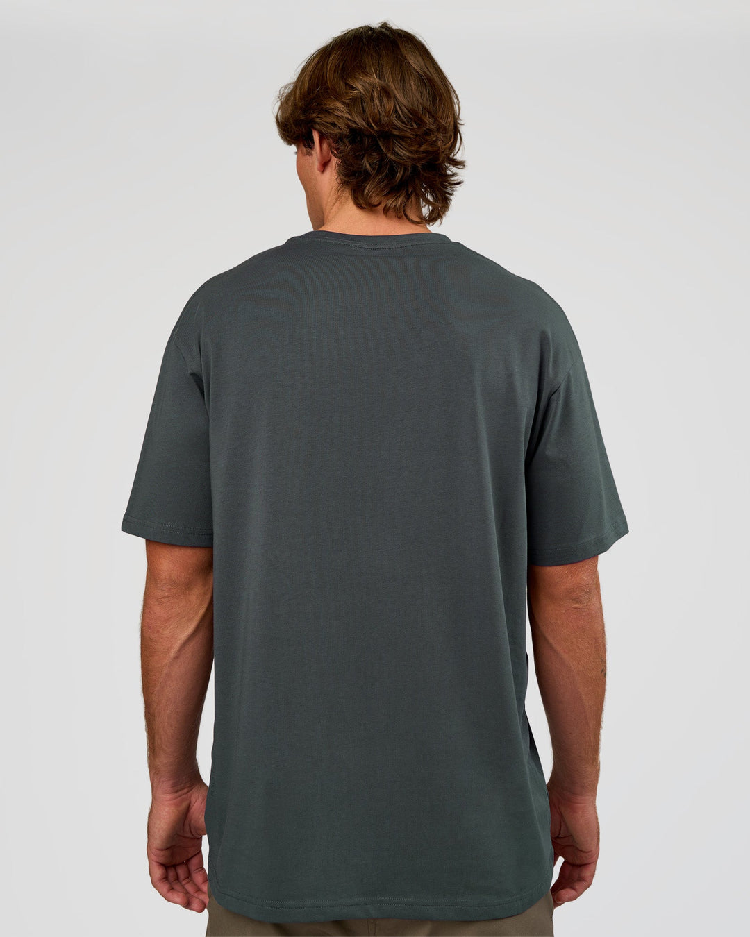Man wearing Base FLXCotton Tee Oversized - Dark Slate | Model:Marcus | Size:L